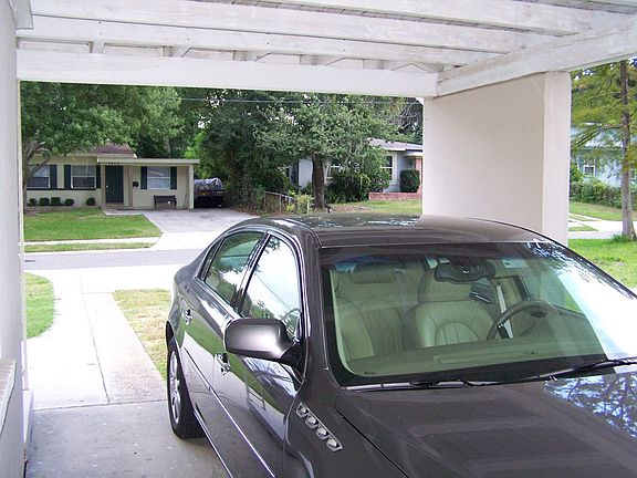 Carport for large car/Or Close in for another Room.