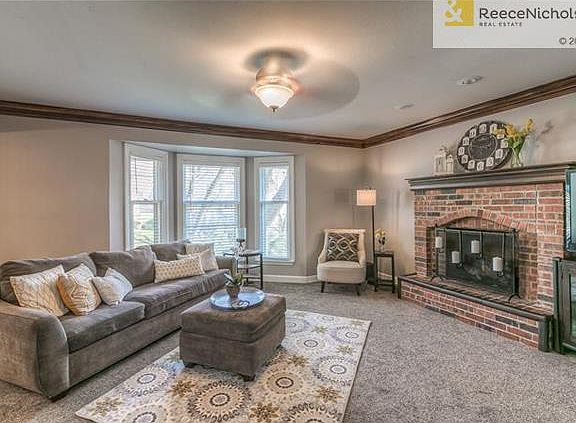 Enjoy the cozy family room with gas log fireplace and bay window with views of the backyard. Sink your toes into the upgraded carpet and pad.