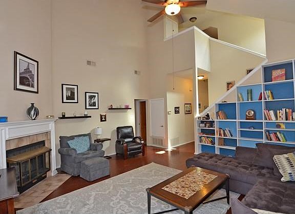 Gorgeous and spacious living room with fireplace.