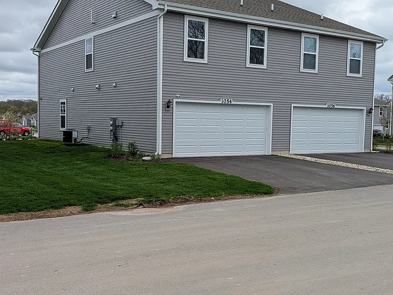 Twinhome Back Exterior. 
Photo of a similar unit