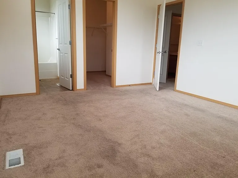 Master bedroom includes bathroom and walk in closet.