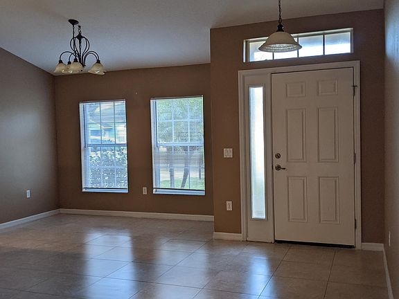 Front door and dining room