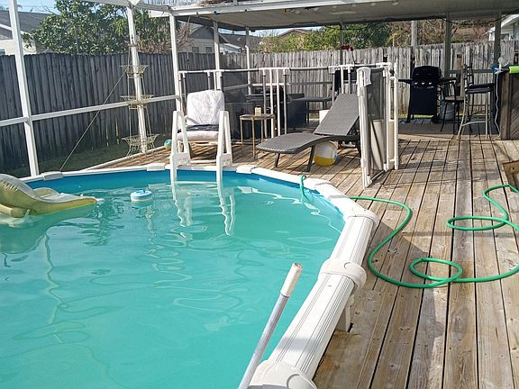 Gorgeous Outdoor Pool, Bar, and Lounge Area