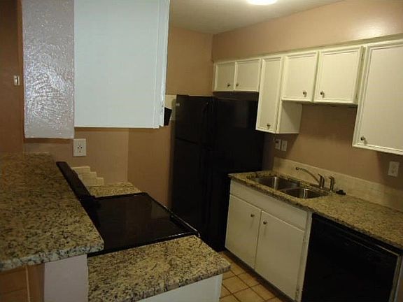 Kitchen with granite counter