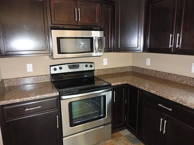 Backsplash has been added length of wall behind stove