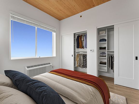Experience the inviting charm of this stylish bedroom with ample closet space.