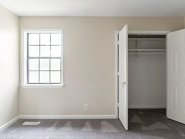 Please note that the carpet has been removed and replaced with hardwood floors.