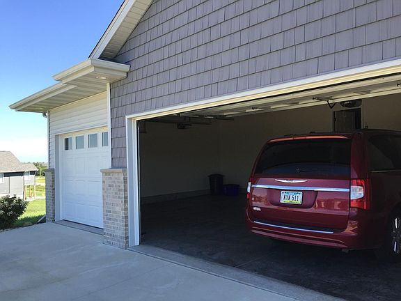 View of 3 stall garage