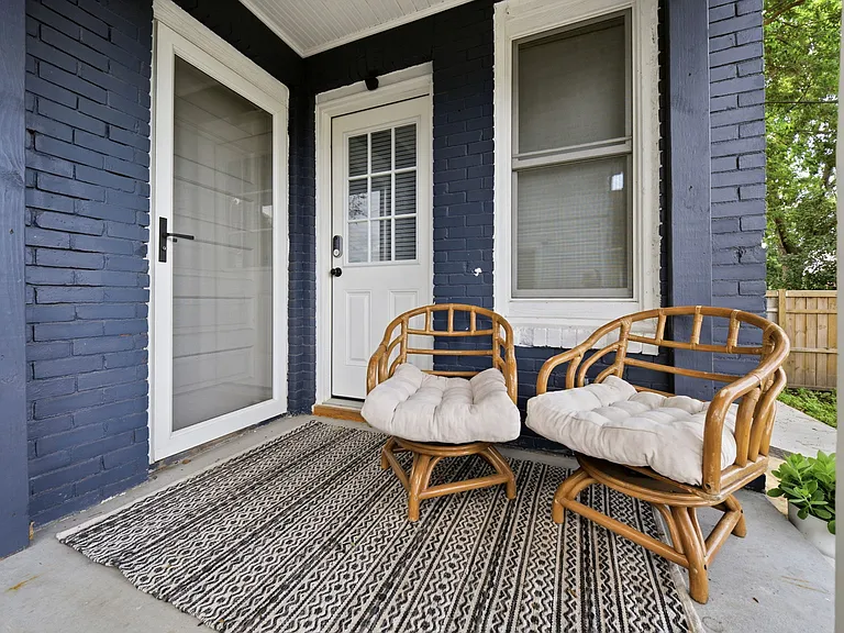 Back entrance. Your door is on the left.