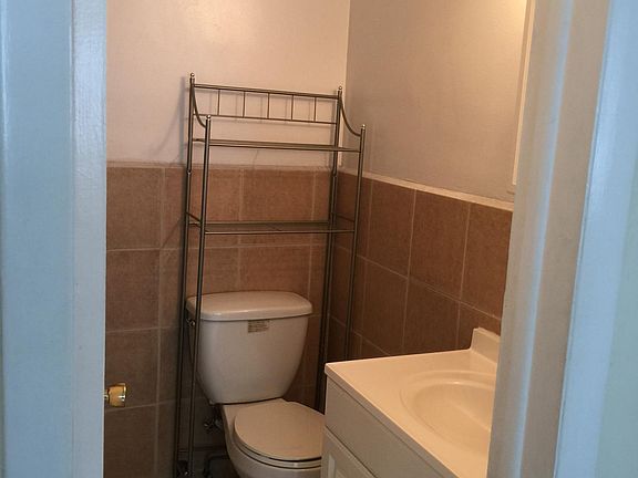 new master bathroom has shower, vanity and medicine