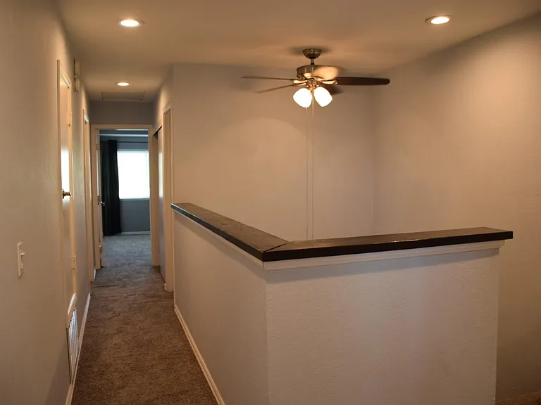 Hallway to master and bedroom 3