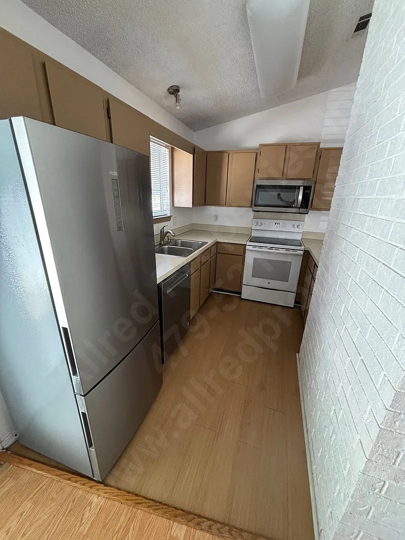 Getting Ready For You! Updated 2-Bedroom Duplex with Fenced Yard & Lawn Maintenance! NO PETS — Photo 4