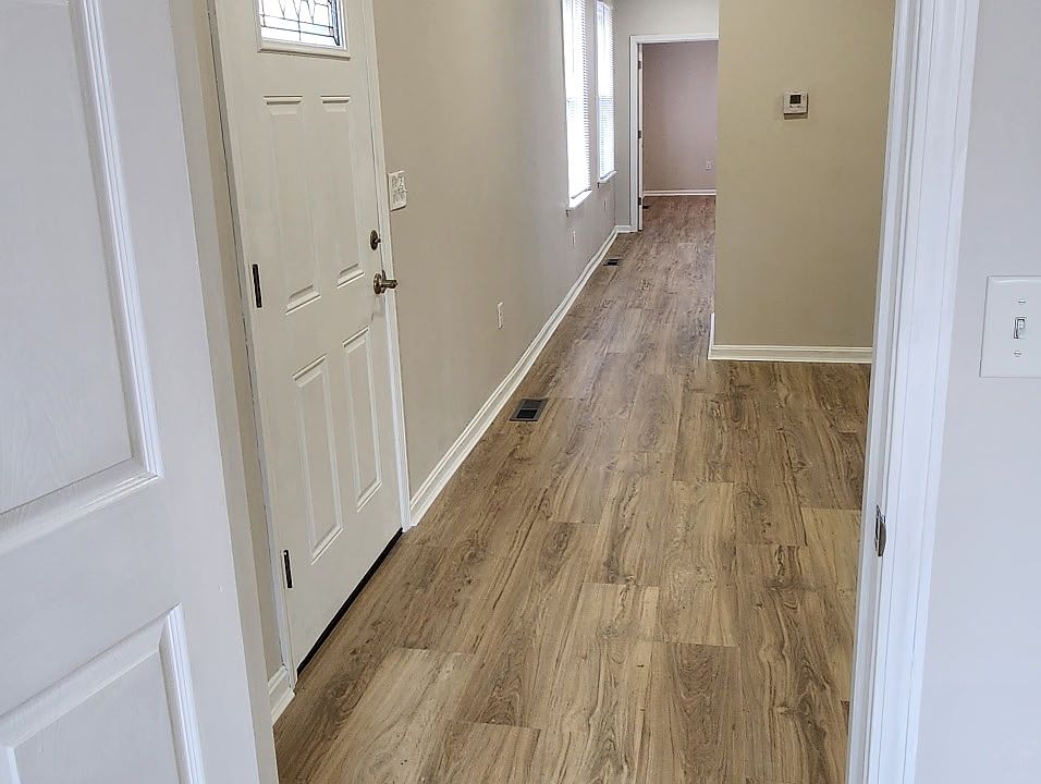 Entrance/Primary Bedroom/ Living Room