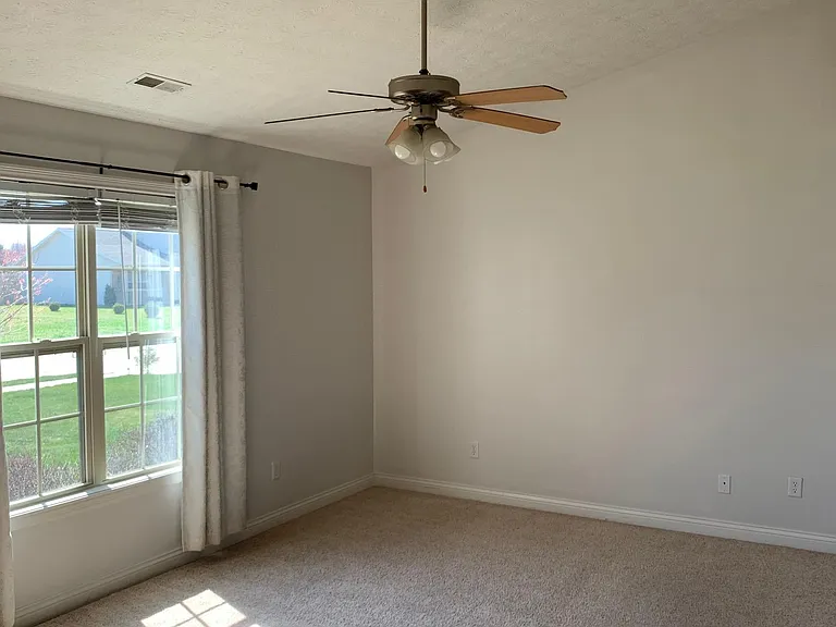 Master bedroom, with it's own bathroom and walk-in closet, has high ceilings, and is south facing for maximum light/airy feel