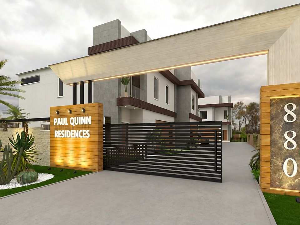 . Gated entry to Paul Quinn Residences -- a private 3-home steel-framed enclave at 883 Paul Quinn S