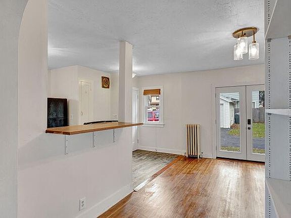 Dining area and kitchen. double door entrance and rear entrance