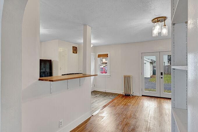 Dining area and kitchen. double door entrance and rear entrance