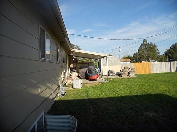 Backyard with covered patio 