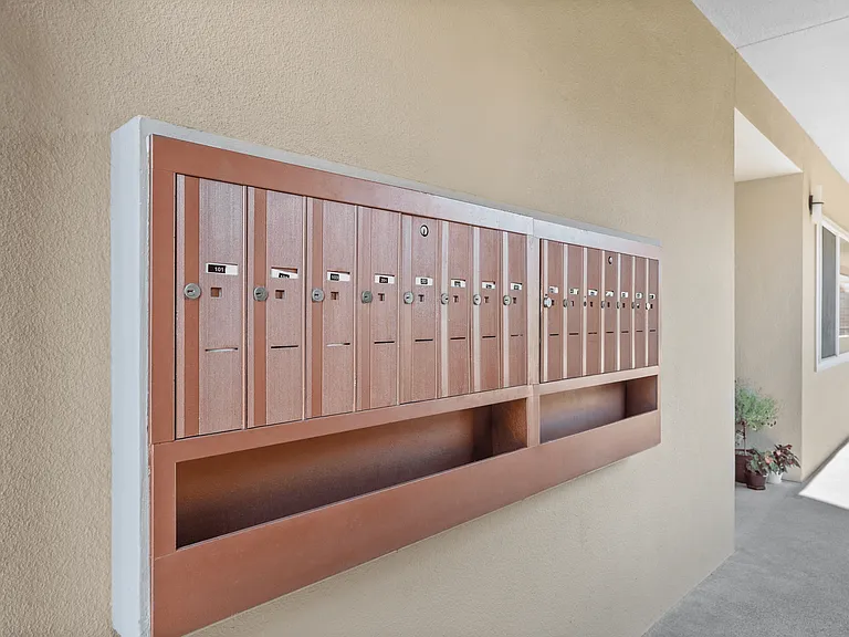 Convenient, secure mailboxes located by the gated entrance.