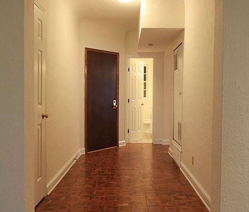 View from living room toward foyer and entrance.