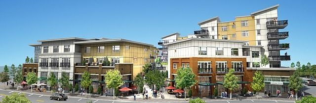 This townhome will be on the far left of this photo, overlooking the park