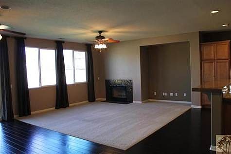 Great room with fireplace, ceiling fans, media niche thru out this lovely home!