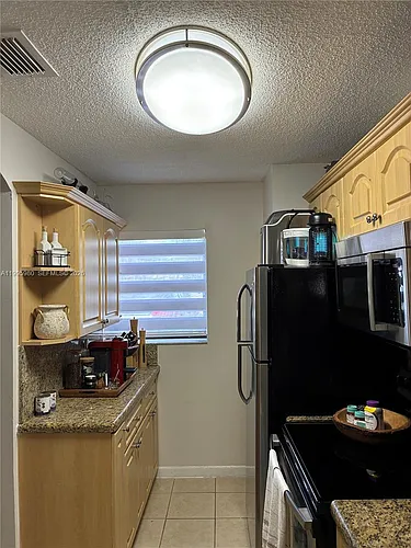 6858 NW 173rd Dr #305 Photo 1