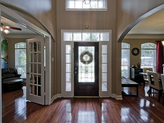 Enter the front door and see the Study with French doors on 1 side and the Formal Dining on the other.