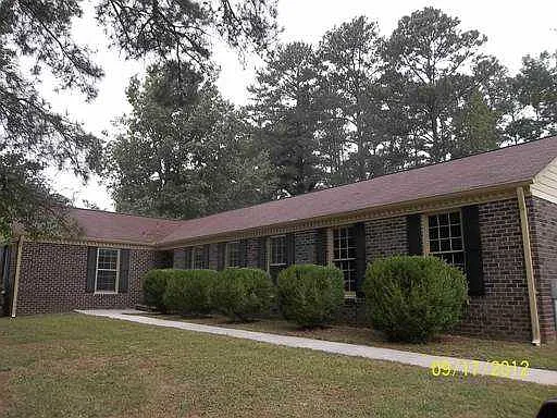 104 Rolling Oaks Dr NW photo 1
