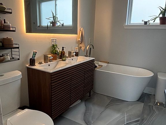 3rd floor primary suite tub and walk in shower