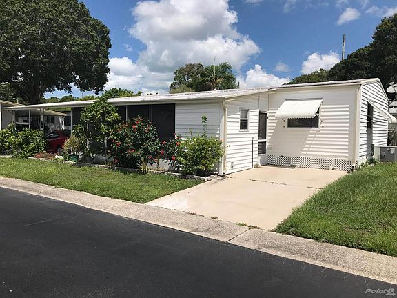 Side of home and 2nd driveway!!