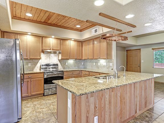 4th image of 11031 Esmeralda Dr NW