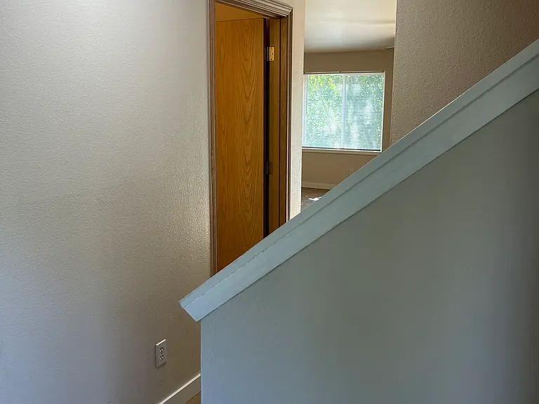 Hallway and stair case to upstairs