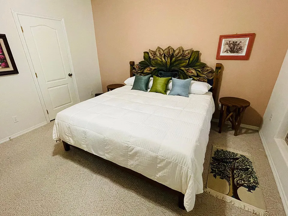 Master bedroom. King size bed.