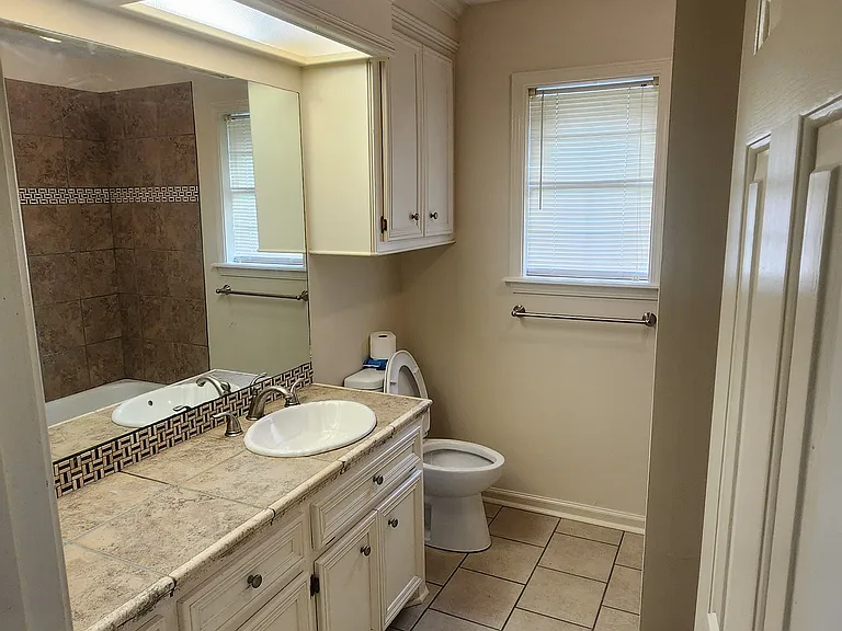 Second Bathroom, tile countertop and flooring