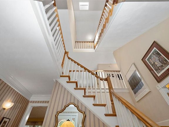Foyer staircase looking up to the third floor