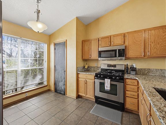 5th image of 8109 Stonecreek Ave NW