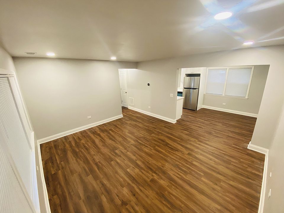 Open floor plan with new flooring