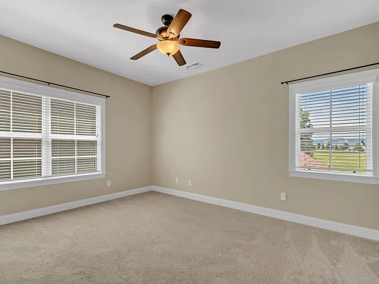 Large third bedroom with lots of windows
