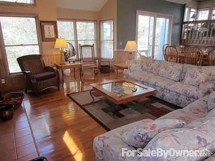 Open floor plan
						:
						Ships watch with ocean sunrise views. Dining room and Living room.