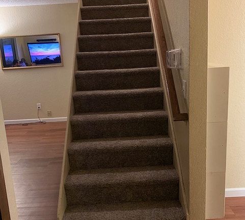 Stairs leading to upstairs bedrooms