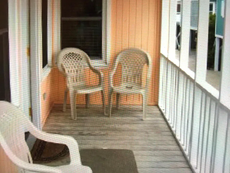 Front porch with 2 rocking chairs added