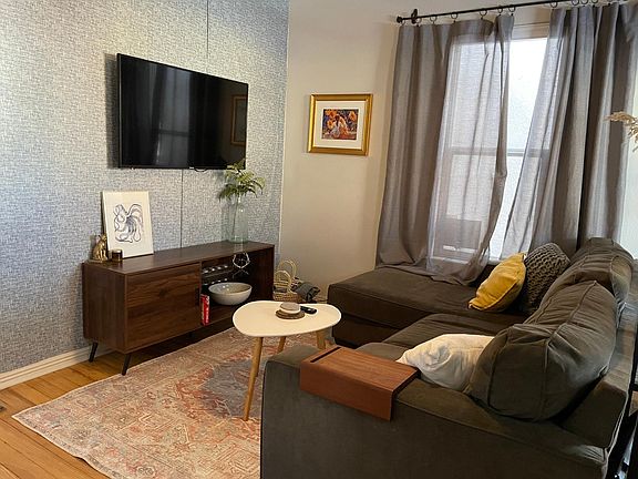 Comfortable couch and Hisense Smart TV