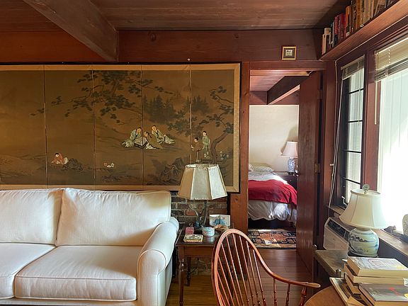 Living room and view into bedrooom