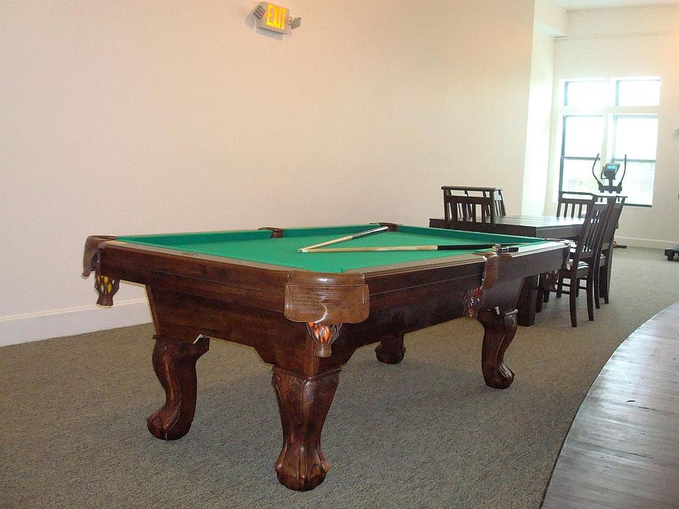 Community Room with Exercise Equipment and Pool Table