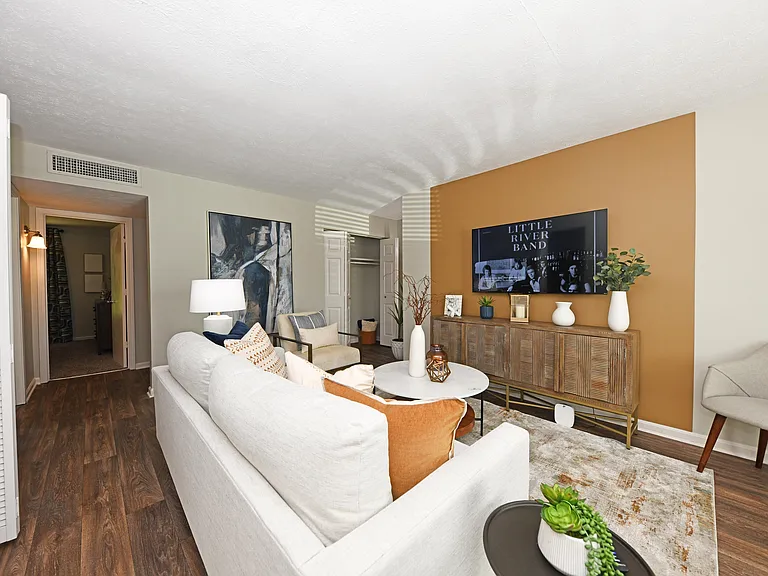 Spacious living room with hardwood-style flooring