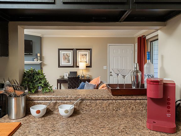 Experience modern comfort with this beautifully designed open kitchen and living area.