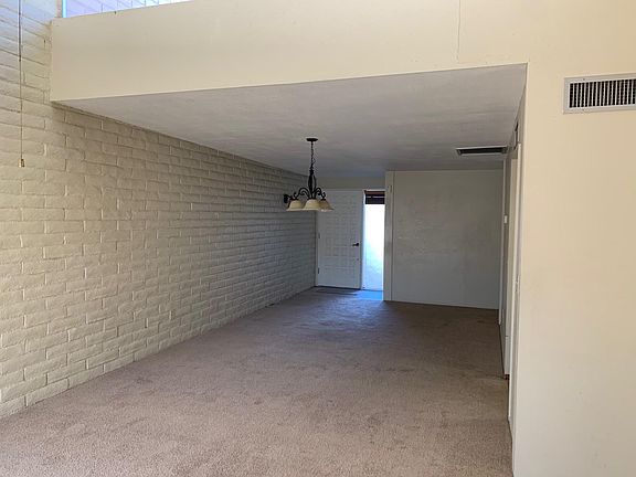 Dining area and tiled front entry, from living room