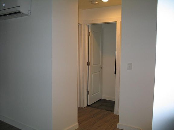 View of the hallway to bathroom from living room.