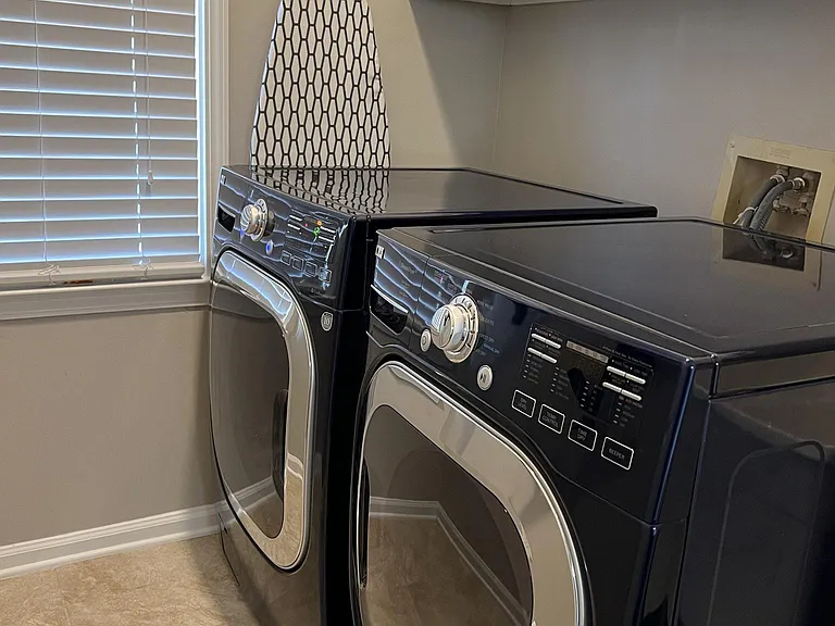 Separate laundry room on main floor with Washer and Dryer included